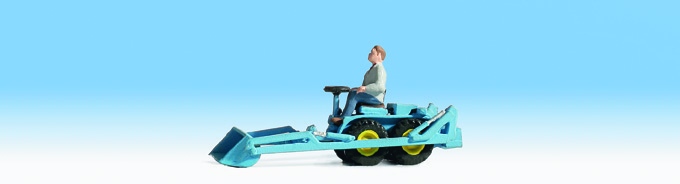 Mini tracteur avec chargeur frontal et conducteur